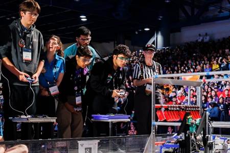 Students competing with their robot at the FIRST Championship