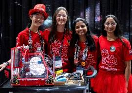 Four Students with their FIRST Tech Challenge Robot